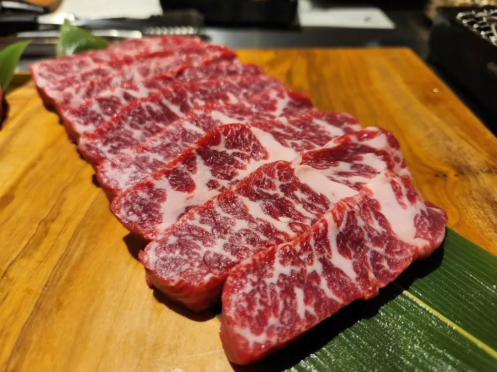 Sliced Marbled Beef on Wood